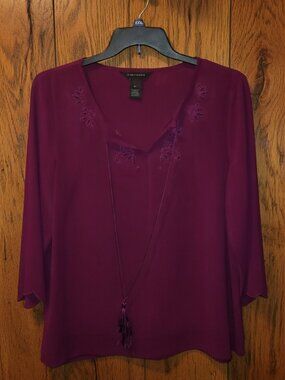 Rich purple colored blouse with dangles